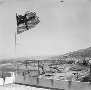 Reggio, 3 September 1943 (Operation Baytown): The White Ensign flies over Reggio harbour